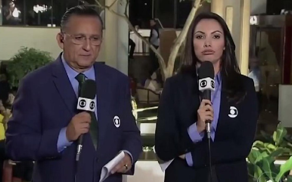 Patrícia Poeta bufa no ar com Galvão Bueno em 2 de junho, durante cobertura da Copa do Mundo - Reprodução/TV Globo
